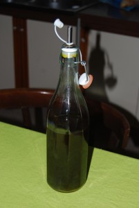 FlesOlijflie Stilleven met fles olijfolie